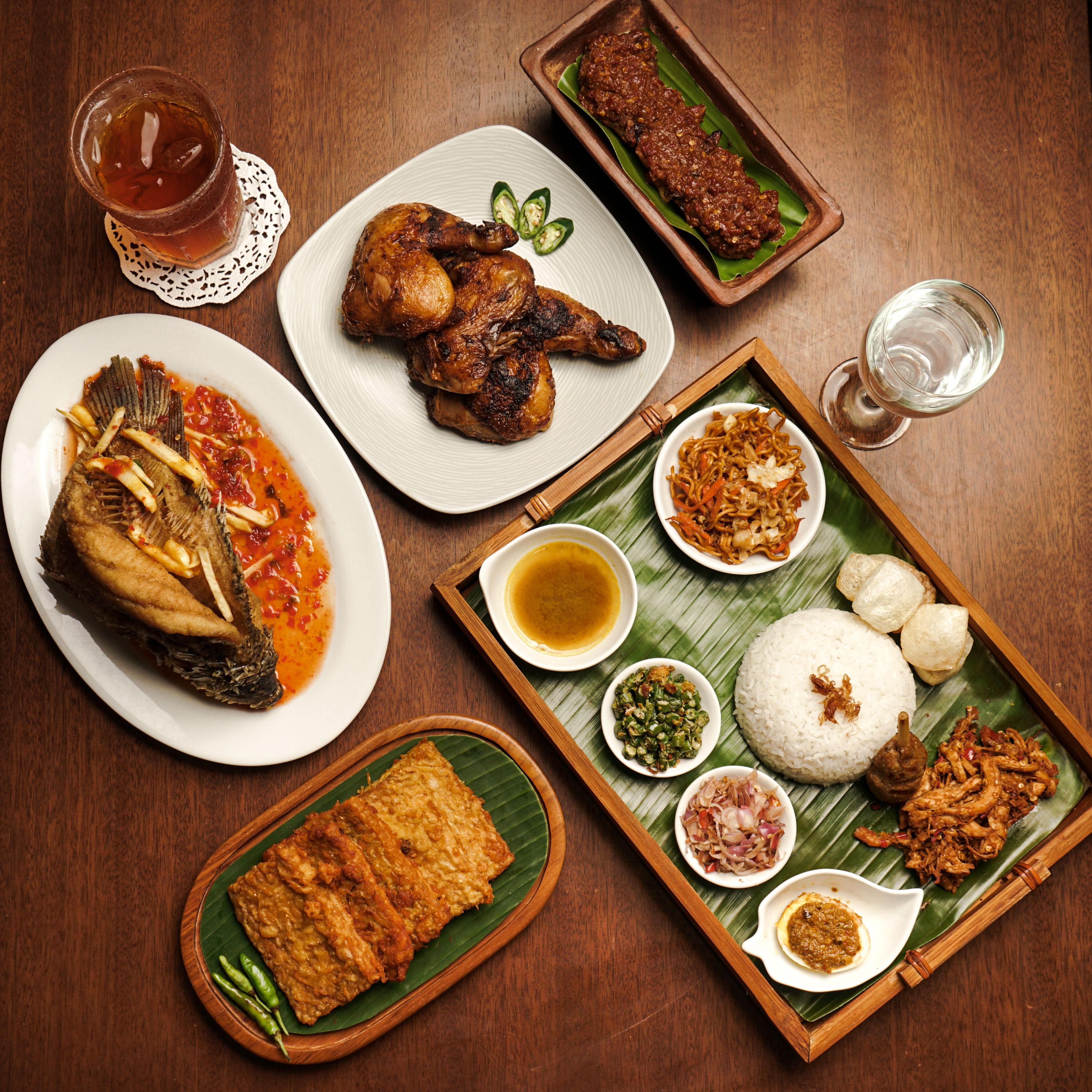 Traditional Balinese dishes prepared at a local warung, showing a variety of flavours and textures